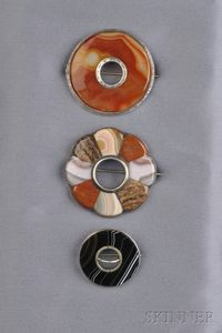 Three brooches. $356.00 Silver