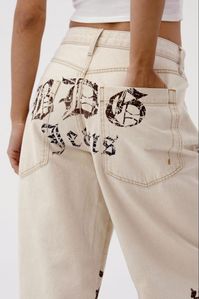 90s-inspired ultra-baggy jeans by BDG. In a logo laser print denim with a relaxed fit and exaggerated detailing. Cut to a low waist, belt loops, button and zip closure and a signature five-pocket silhouette. 