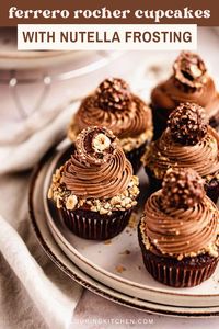 These cupcakes are stuffed and topped with ferrero rocher, are super soft and fluffy, and topped with a swirl of creamy nutella frosting.