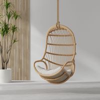 Glide through the air in this hanging rattan swing chair with comfy seat cushion as you enjoy the sunrise, sunset or simply a good book. This natural tone rattan hanging chair is sure to be a focal point of any home décor design. 29 inches wide x 30 inches deep x 47 inches tall. Seat cushion 24 inches x 26 inches Hand crafted from naturally grown Rattan. Not intended for outdoor use. Cannot be left exposed to the elements. 6 meters (19.6 feet) of hemp rope included. Hanging hardware is NOT inclu