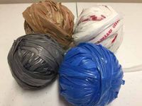 Learn to make yarn from recycled plastic shopping bags.  Recycle and reuse.  Click for our free video and photo tutorial with step-by-step instructions.