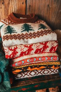 The most all-American, leaf falling, fire crackling, acorn popping, apple picking, pumpkin spicing, turkey roasting, eggnog nogging, coziest cabin, road trip tripping sweater of all. The McCallister Sweater is a pre-order item in sizes XS, M, L, XL and XXL and ships on or around 12/7. Product Details: Wash Cold, Air Dry Woven Label Wool Acrylic Blend: 70% Acrylic, 30% Wool Marled Oatmeal Background with Cranberry Moose Motif Unisex Tailored Fit--Ladies should size down one size Imported