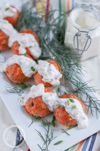 These Salmon Meatballs with Caper Dill Tarter Sauce are a fun (and delicious) way to get more healthy salmon into your family's meals!  Loaded with healthy fats, keto/low carb friendly and made without any gluten or grains!