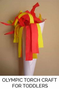 a torch made of a cone of white paper, with red and yellow tissue paper as the flames