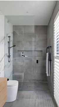 Gray Bathroom Design With Light Wood Vanity