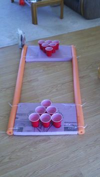 Homemade pool pong with some styrofoam, noodles, zip ties, and some good cutting techniques for cup pockets.