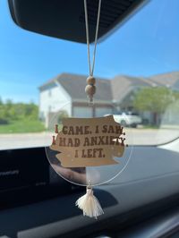 Accessorize your car with a cute rearview mirror charm!  Size: 3" x 3" -clear acrylic circle  -elastic string length: 6" Each charm comes with 2 beads on the string and a small cream tassel. Follow me on social media!  Instagram @craftingbui Thank you so much for shopping small!