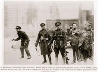 National Army troops just as the Four Courts in Dublin explodes.