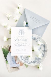 The Vivienne suite was designed to exude a sense of refinement and subtlety. Delicate script lettering is expertly typeset and balanced with a traditional serif for an overall graceful and feminine approach. With a selection of optional crest, wreath, and floral borders, Vivienne sets the tone not only for your paper suite, but most importantly, your wedding day.