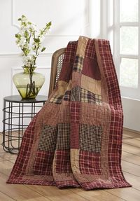 Chilly nights are perfect for snuggling under a quilted throw available at the Quilt Shop. Find the perfect accent to your decor in our complete collection.