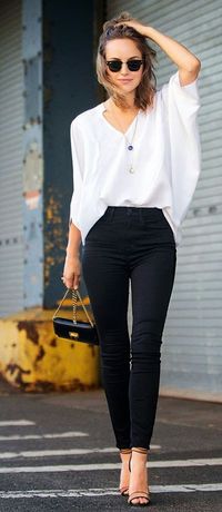 Add shape to a billowy blouse by tucking the front into a pair of high waisted jeans. It not only balances your look but it's also oh so flattering!