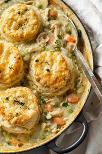 Chicken Pot Pie with Biscuits is an easy comfort food dinner recipe that your family will love! Make it with homemade or refrigerated biscuits!