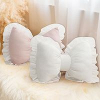 PRICES MAY VARY. High Quality Materials: The round pillow is made of Polyester(PP Cotton) Filling and Velvet fabric. That is comfortable and soft, also not easy to fade Cute Design:This bow pillow adopts an elegant bow shape design, supplemented by cute ruffle elements, making the whole bow shape pillow more lovely. Cute, elegant and unique, it adds elegance and romance to your space Applicable Occasions: The bow pillow can be used as car waist pillow, home and office chair waist cushion, home s