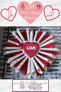 LOVE Sheet Music Wreath made with deco mesh, old sheet music, a heart shaped chocolate box, and a few other things...