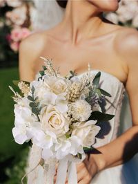 [Exquisite]An unforgettable wedding must have exquisite bouquet for bride. The wedding flowers bouquets contains Champagne White Rose interspersed hydrangea, gypsophila, lavender, and green leaves. Elegant flowers and lush greenery come together, with ribbons and jute rope, turning it into an eye-catching and beautiful bouquet. [MaterialThe main flowers are made of premium fabric, it's not only has a beautiful appearance like fresh flowers but also will stay beautiful as always, to preserve the memories of your wedding day forever. [Size]The flower bouquets for wedding is approx. 8.5" wide by 10.2" tall. It is so appropriate size, and will be a wedding accessory that every bride will love to have. [Unique]Our every design is for you to have a cozy and romantic wedding! We tell you from the