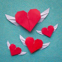 Cute origami hearts with wings from a single sheet. No glue or scissors required! #craftgawker