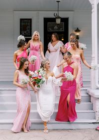 This garden party wedding at the Wildflower 301 was featured on Ruffled Blog. The bride wore white while her bridesmaids wore mismatched pink dresses. Bold pink bridesmaids dress inspo, long bridesmaids dresses! Planned by Always and Forever Events and captured by Sarah Blaze Photography, every moment in this wedding is painted in the vibrant shades of nature’s most captivating palette in bright pink and leafy greens at the beautiful The Wildflower 301 . Seen in Ruffled.