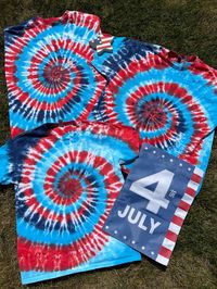 4th of July Tie Dye T-Shirt - 100% Cotton - Procion Fiber Reactive Dyes Fire Red, Glacier Blue, Turquoise, and Blueberry Multiple sizes available. Prices may vary based on size. Each shirt is hand crafted and *made to order* with fiber reactive Procion dyes.   Dyes are non-toxic. Colors stay vibrant with every wash. Important Information: Each shirt is 100% unique and made with love!  We are committed to giving you a product that we, ourselves, would proudly wear. The shirt listed is *similar* t