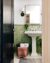 pretty square green tile in the bathroom