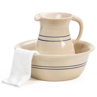 Before indoor plumbing, every home had a basin and water pitcher for washing up. Our old-fashioned set carries on that tradition. Each stoneware piece is hand turned on a pottery wheel. Makes a stunning display for your home. Fully functional, too. Oven, microwave and dishwasher safe. Lead-free glaze. Pitcher capacity almost 3 quarts (88 fl oz). Pitcher about 8-7/8"H, 4 lb. Basin about 4-3/8"H x 12-1/8"OD, 4-3/4 lb. USA made in Texas. Note: Towel (pictured above) not included.