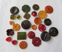 Bakelite Bakelite Bakelite - a wonderful assortment - all tested positive for bakelite. Good condition - need a little cleaning. This listing is for all 25 buttons.   Ready for your sewing or craft project. The buttons I list are all vintage and although  they are in good condition - they are vintage and may have some minor scratches which do not distract from the overall look of the button. Will always combine shipping whenever possible and will refund if the figured amount is too high. Enjoy a