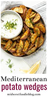 Greek Potato Wedges | Midwest Foodie | These potatoes wedges are loaded with all your favorite Mediterranean spices and served with a cool, creamy tzatziki sauce! #midwestfoodie