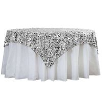 PRICES MAY VARY. Approximate Measurements: 72"x72" Square.; Fabric: Big Sequin on Mesh Base(seamless); Sequin Size: 18mm; Care Instructions: Do not dry clean or machine wash. Wipe with a soft damp cloth; PREMIUM QUALITY: This table overlay is made from a high-quality big sequin on a mesh base (seamless). This elegantly shimmering piece comprises shiny material crafted with the utmost perfection. To make things swankier, we have designed it on the master of luster. LUSTROUS & ELEGANT: Like its na