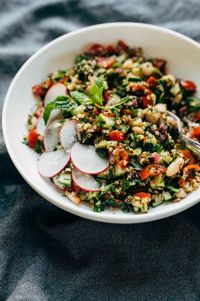 Chopped Greek Salad - clean eating with TONS of flavor! cucumbers, tomato, kalamata olives, red onion, mint, parsley, quinoa, and a lemon olive oil drizzle! vegan, vegetarian. #vegan #vegetarian #sugarfree #healthy #cleaneating #dinner #recipe | pinchofyum.com