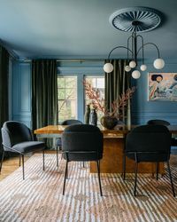 A saturated dining room brimming with texture—we adore this space from @‌home_ec_op featuring the Bauhaus-inspired Comet Chandelier. 📸 @margaretrajic | Styled by @brandidevers