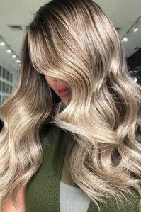 Dirty blonde hair inspiration? Check out our list of 35+ gorgeous dirty blond hair styles for any hair length or hair texture! Full list inside the blog.