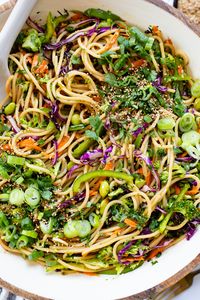 This Sesame Ginger Noodle Salad 🥗 is filled with TONS of veggies, cold noodles and a super tasty homemade sesame ginger dressing.