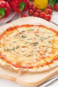 This Cassava Flour Pizza Crust is gluten-free and grain-free, and made without yeast. It's a delicious way to enjoy homemade pizza. This recipe is appropriate for paleo and yeast-free diets.