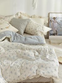 Bring a touch of farmhouse chic style to your sleep space with this Cottage Blue Flower Comforter. This cozy cotton bedding features a calming blue floral design and comes with coordinating pillows and mattress pads for a complete look. - Natural cotton with durability and softness- Minimal and simple mood - Cute lace finish around the edges of duvets and pillow covers- Double sided- Pillows, pillow covers, and mattress covers sold separately *Price varies by size*There is an additional charge for each set composition.**You can choose SS set with Q sized pillowcase as well.- SS COMFORTER SET (SS comforter + 1P SS pillowcase)- SS PAD SET (SS comforter + 1P SS pillowcase + SS pad)- Q COMFORTER SET (Q comforter + 2P Q pillowcase)- Q PAD SET (Q comforter + 2P Q pillowcase +