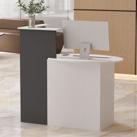 The Timechee Laminate Reception Desk Grey White is a podium-style desk with a modern and sleek design, perfect for reception areas in Salons, Spas, and Medical Offices.