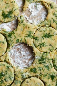 Anna Jones gives Welsh cakes a savoury twist in this simple, easy recipe, studding the pastry circles with olives, herbs and capers.