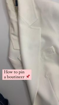 Are you intimidated by pinning a boutonniere? Let us help! Always start by pushing the pin away from the body, next try to find shorter pins like Pixie Pins, lastly, always pin at the top and the bottom