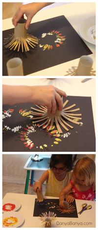 Simple fireworks painting idea for kids using DIY toilet paper roll firework stamp.