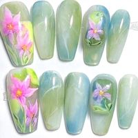 - Authentic hand-painted press-on, made with heart by real nail techs- Best quality gel and gems, ultra shiny, solid and long-lasting- 7 steps full salon procedure, bringing the real gel manicure set to youThe package contains:-10 nails the same size as your nails-24 glue tabs-Mini nail file- Extra gifts included!