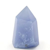 Invite calming energies into your space with these beautiful Small Blue Chalcedony Towers. Known for their soft, serene blue hues, these towers radiate a gentle, soothing energy that promotes peace, balance, and emotional healing. Each crystal point is finely polished, highlighting the stone's natural translucence and delicate banding. Key Features: Material: Genuine Blue Chalcedony Size: Small, perfect for meditation, crystal grids, or display Color: Soft, soothing blue with subtle banding and