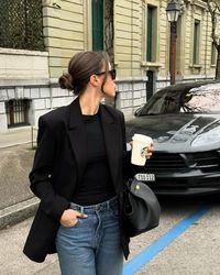 Classic and chic in Geneva with a black blazer, jeans, and my Demellier London bag. See more on @ivilina_ivi! #fashioninspo #streetstyle #ootd #parisianvibe #demellierlondon