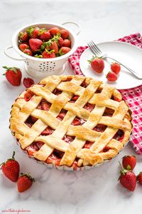 This Classic Strawberry Pie is the perfect summer dessert recipe made with an all-butter crust and fresh strawberries. It's a simple pie recipe that's easy enough for anyone to make - even beginners! Be sure to follow my pro tips below for the perfect old fashioned strawberry pie! Recipe from thebusybaker.ca! #pie #strawberries #strawberrypie #homemade #homesteading #oldfashionedpie #classicrecipe #homemade #dessert #simple #fruit #berries