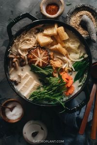 Vegan Soy Milk Hot Pot (Tonyu Nabe) is a deeply comforting and nourishing pot of creamy, umami broth with assorted veggies, mushrooms, and tofu. It’s easy, fairly quick to make, and versatile.