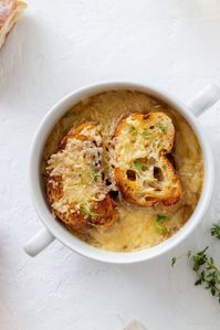 Gordon Ramsay’s French Onion Soup is a delectable dish that works well as an appetizer or light main course. It takes around 60-65 minutes to prepare and cook. The crowning touch is the cheese-topped French bread, making it a culinary gem to savor.