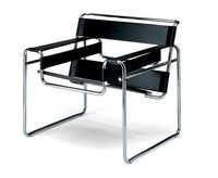 Marcel Breuer's Wassily Chair (1925) is one of the most famous products of the Bauhaus School. It is a club armchair with all the stuffing taken out, leaving a behind a skeletal framework and stretche