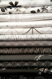 Step into the world of InkPerfect: Carbon Edition! This striking grayscale collection features deep blacks, rich charcoals, and sophisticated greys and whites, this collection offers endless creative possibilities with our premium Oeko-Tex quilting cotton and versatile substrates. Available in quilting cotton prints, 2.5 Edition Binding, 4 Linen Blends, and precuts: Fat Quarters & 10-inch square packs. Perfect for patchwork quilts, home decor, and more! #FabricCrafts #Quilting #Sewing