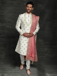 Here is the latest trending design of the silk white sherwani for wedding wear. 👉This comes with a contrast matching dupatta. 👉Inbox us for any Information 👉Tab on the image to buy this one online.