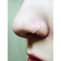 Criss Cross Nose Ring (fake) ❤ liked on Polyvore featuring jewelry, rings, punk rings, imitation jewelry, punk rock jewelry, artificial jewelry and imitation rings