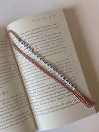 Introducing the Macramé Beaded Bookmark - the perfect blend of craftsmanship and functionality! 📚 Elevate Your Reading Experience: This handmade macramé beaded bookmark adds a pop of fun to your reading routine. Slip it between the pages of your favorite book, journal, or planner, and let it become a charming companion on your literary journey. 🌟 Unique Artistry: Each bookmark is handcrafted. The intricate macramé knotting technique, combined with carefully chosen beads, creates a one-of-a-kind piece of functional art. 🎁 Perfect Gift: Searching for a thoughtful gift for the book lover in your life? Look no further! The macramé beaded bookmark makes a delightful present for birthdays, holidays, or just because. Personalize it with their favorite colors for an extra special touch. ⏳ Versa