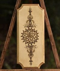 "This is a very intricate wood burning of an Hindi inspired mandala drawing. It is burned on a 4\"x13\"piece of birch plywood. It has been sealed and lacquered."