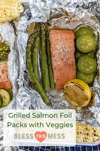 A fresh and fast meal, Grilled Salmon Foil Packs with Veggies couldn't be easier to toss together and grill up quickly with the simple flavorings of some lemon, butter, salt, and pepper. #salmonpacks #easygrilledsalmon #grilledsalmon #summermeals #salmon